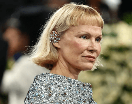 Pamela Anderson showing off her cut new bangs and short hairdo